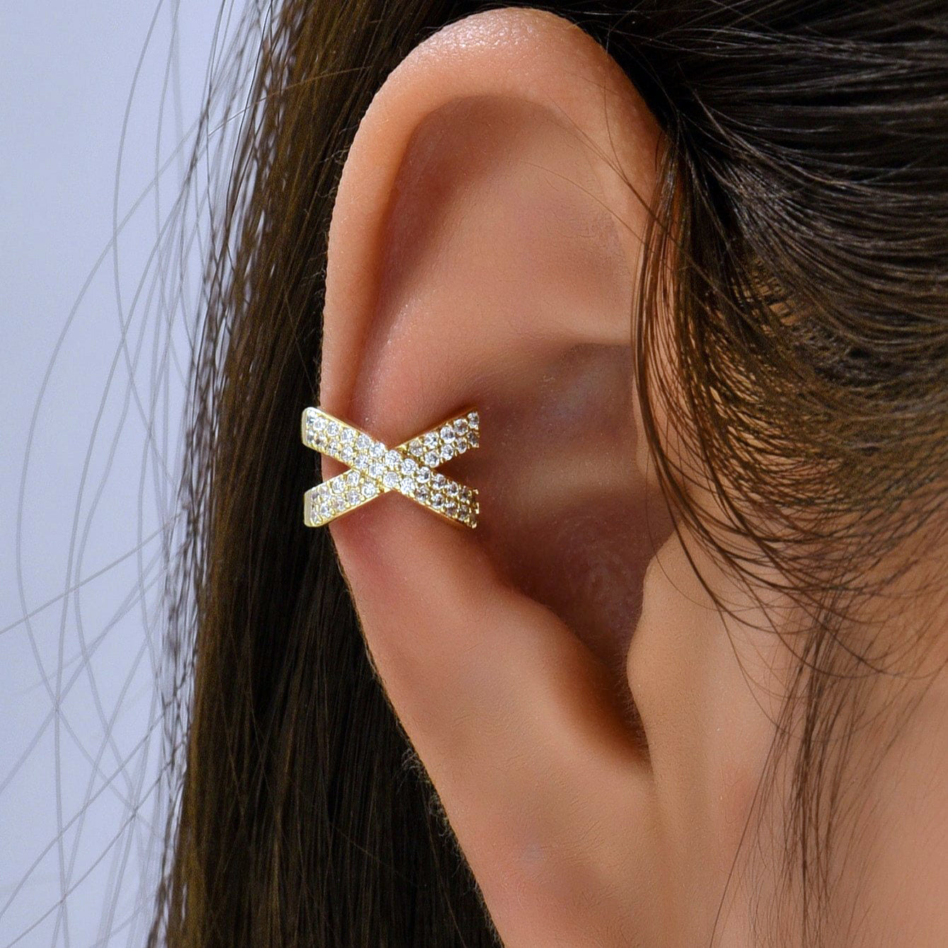Brinco/Piercing X com Zircônias