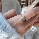 Anel com resina colorida