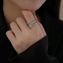 Anel entrelaçado com zircônia - Ajustável