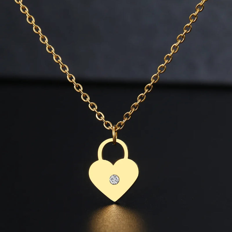 colar com pingente, colar banhado a ouro, corrente de aço inoxidável, colar aço inoxidável, colares em aço inoxidável, colar coração e ponto luz de aço inoxidável