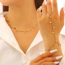Conjunto de colar e pulseira em aço inoxidável com estampa de folhas, luxuoso e requintado, banhado a ouro, à prova d'água.