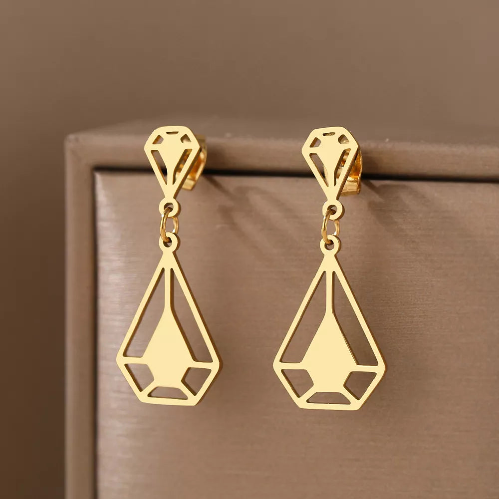 brincos, brincos femininos, brinco de cruz, brinco de cruzinha, brinco dourado, brincos antialérgicos, brinco folheado a ouro, brinco banhado a ouro, brinco de argola,